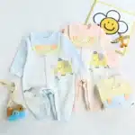 Enterizo de algodón orgánico con babero Baby Safari